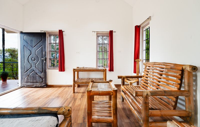 Bamboo furniture lounge with red curtains
