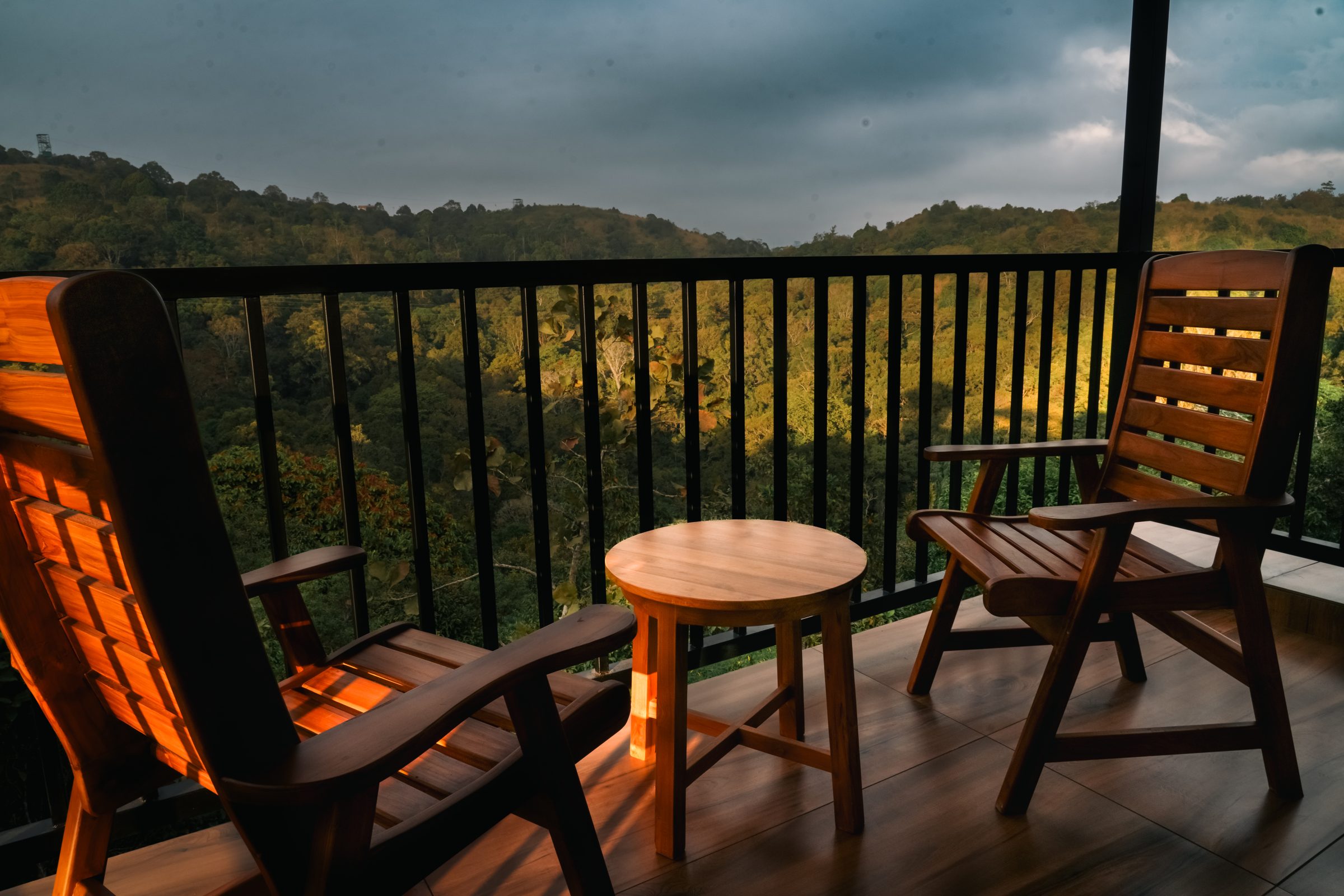 Golden hour on a balcony overlooking the Western Ghats forest
