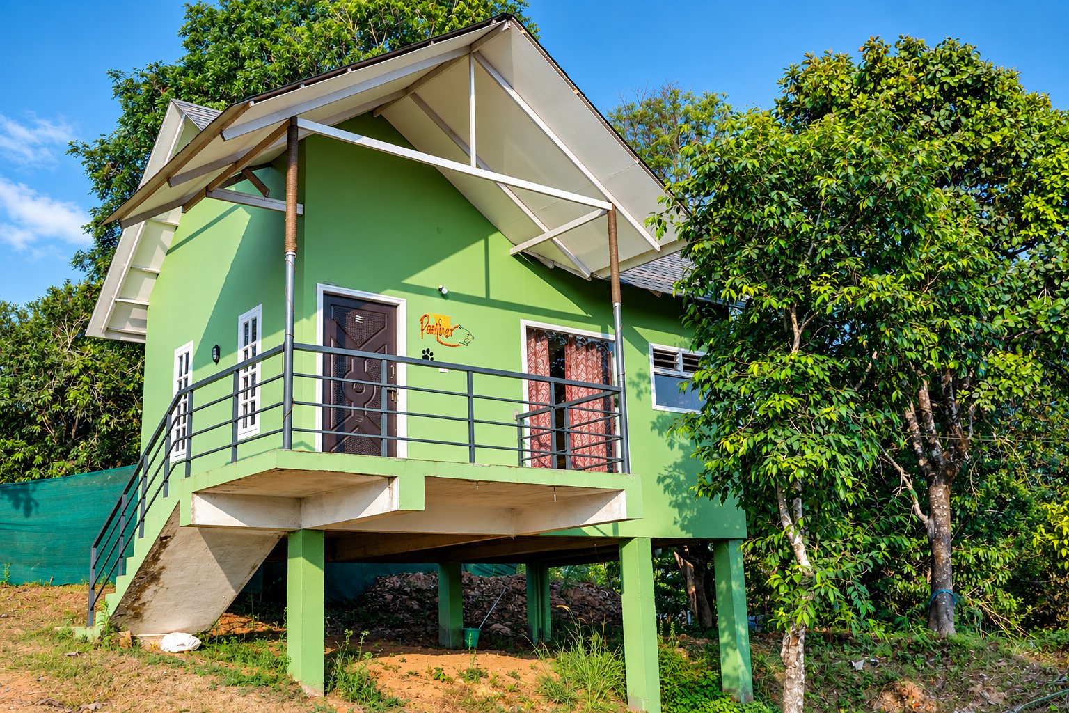 Panther cottage raised on stilts among the treetops